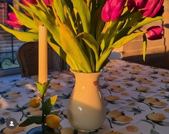 Lemon tablecloth Water-repellent tablecloth with lemons. Table setting. Water-repellent effect retains spilled liquids on the surface.