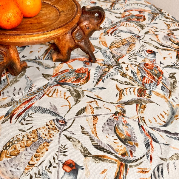 Tablecloth with pheasant birds. Waterproof table cloth. Table setting. Waterproof effect retains spilled liquids on the surface.