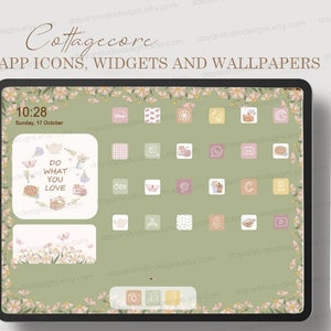 May include: A digital tablet screen displaying a green background with a floral border. The screen shows a collection of app icons with cottagecore themes, including a clock, a teapot, a butterfly, and a house. The text "Cottagecore APP ICONS, WIDGETS AND WALLPAPERS" is displayed at the top of the screen.