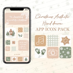 May include: A phone screen displaying a set of Christmas-themed app icons. The icons are hand-drawn and feature a variety of wintery designs, including a house, mittens, a music note, a gingerbread star, a camera, a phone, a snowflake, and a Christmas tree. The text "I'm dreaming of a white Christmas" is displayed at the top of the screen.