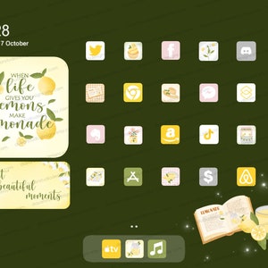 May include: A digital screen with a green background and a variety of app icons. The icons are in a grid pattern and feature images of lemons, teacups, and other objects. The text "WHEN life GIVES YOU lemons MAKE lemonade" is displayed on a yellow background with lemon illustrations.