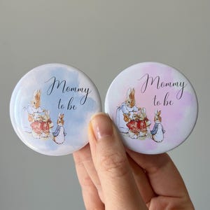 Girl Peter Rabbit Mommy to Be Baby Shower Pins, Daddy to be Badge, Beatrix Potter Theme, Gender Reveal, Beige Buttons, Party Gift Favors