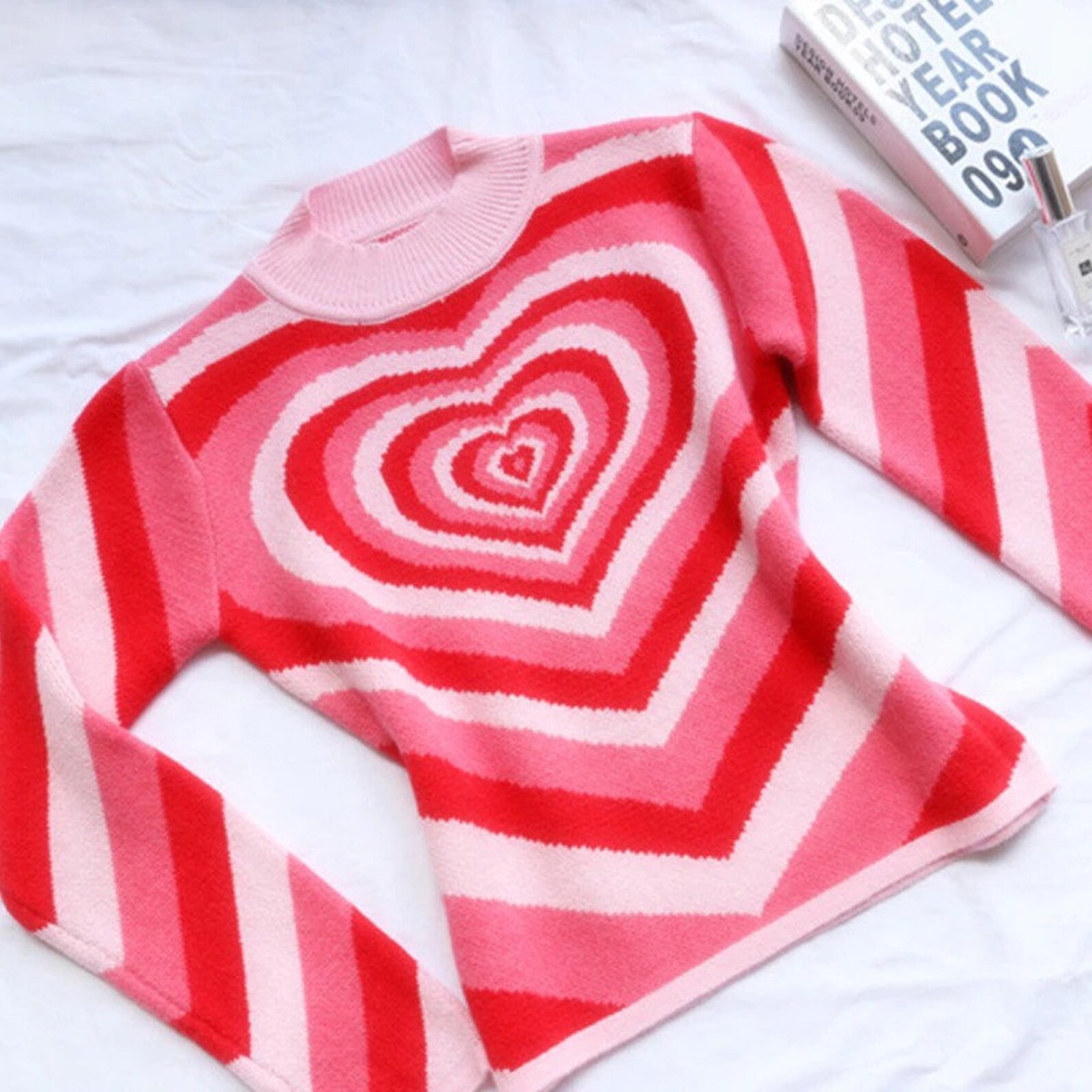 pink and red heart jumper