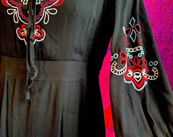 Vintage 1960s embroidered black dress with keyhole neckline