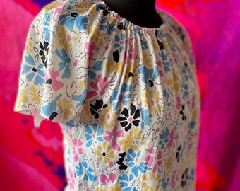 1960s cropped puff sleeve floral too top with raw hem