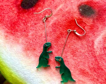 Handmade dinosaur dangle earrings made from recycled plastic