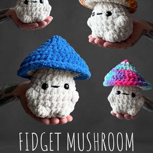 May include: Four handmade crochet fidget mushrooms in various colors. Each mushroom has a white body and a colorful cap. The caps are red, orange, blue, and a mix of pink, blue, and green. The text "FIDGET MUSHROOM" is at the bottom.