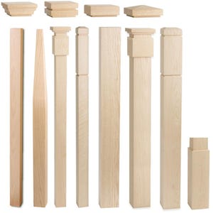 May include: A collection of unfinished wooden posts and decorative elements, showcasing various shapes and sizes. The pieces are light-colored, with visible wood grain, and include square, rectangular, and tapered designs, suitable for architectural or craft projects.