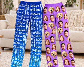 May include: Two pairs of pajama pants. The left pair is bright blue and features the name William printed repeatedly in white text. The right pair is purple and features a repeating pattern of human faces and golden retriever dog faces.