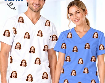 May include: Two V-neck scrub tops, one white and one light blue, each featuring a repeating pattern of a person's face with a smiling expression. The white top has text at the top left that reads Add Your Photos with a curved arrow.