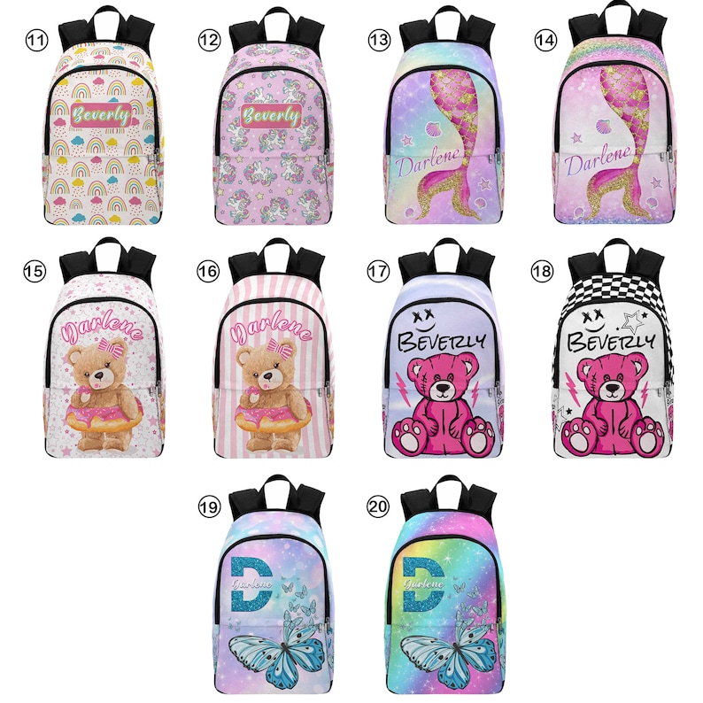 May include: Twenty different designs of personalized backpacks with various colorful patterns and images, including rainbows, unicorns, mermaids, teddy bears, butterflies, and glitter. Each backpack features a name, either "Beverly" or "Darlene", printed on the front.