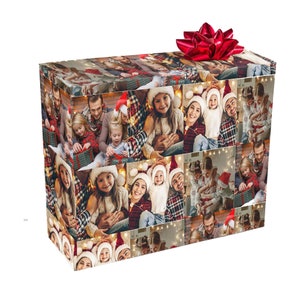 May include: A Christmas gift wrapping paper with a collage of family photos. The paper features a red and green plaid pattern and a variety of photos of people smiling and laughing.