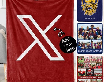 May include: Red fleece blanket with a white X design. The text "Add your logo" is in a black circle. The blanket is being held by a person.