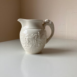 Wedgwood of Etruria & Barlastow White Embossed Jug With Dog Handle