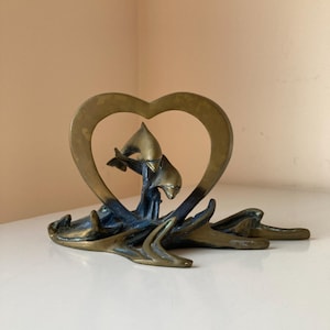 Terrie Bennett Signed and Numbered Bronze Sculpture - Dolphins Jumping From Waves Through Heart