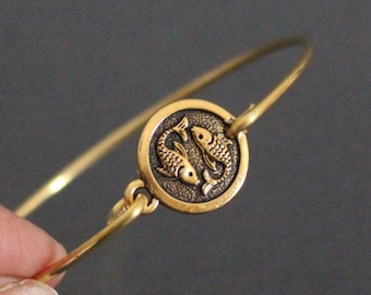 Bracelet à breloques zodiaque : bijoux astrologiques en plaqué or