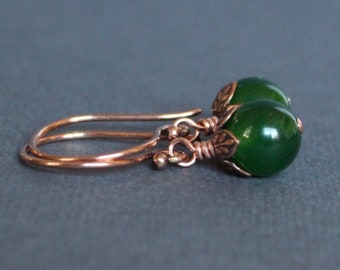 Kanadensiska Jadeörhängen: Mörkgrön sten, kopparblomma