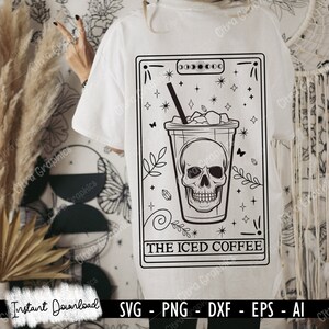 May include: A black and white illustration of a skull inside a cup of iced coffee. The illustration is surrounded by stars and other decorative elements. The text "THE ICED COFFEE" is below the cup.