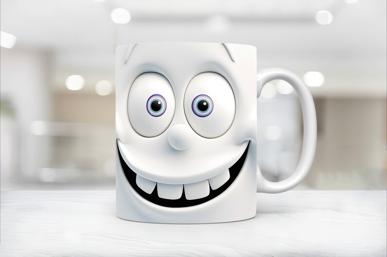 May include: White ceramic mug with a cartoon face with big eyes and a wide smile. The mug has a handle on the right side.