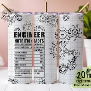 以下が含まれることがあります： 白のタンブラー。黒と白の歯車のデザインと「ENGINEER NUTRITION FACTS」の文字。タンブラーには金のストローと「20 FREE TUMBLER DESIGNS INCLUDED」と書かれた緑色のステッカーが付いています。