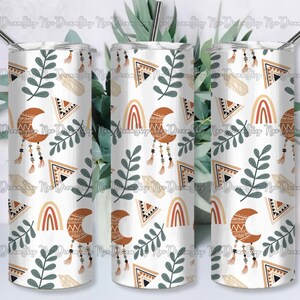 May include: Three stainless steel tumblers with a white background and a repeating pattern of orange, brown, and white geometric shapes, crescent moons, and green leaves.