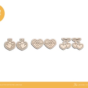 May include: Five laser cut designs for crafting projects. The designs include two heart-shaped bottles, two heart-shaped donuts with icing, and two cherries with stems.