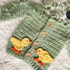 Crochet baby cardigan with Easter chicks