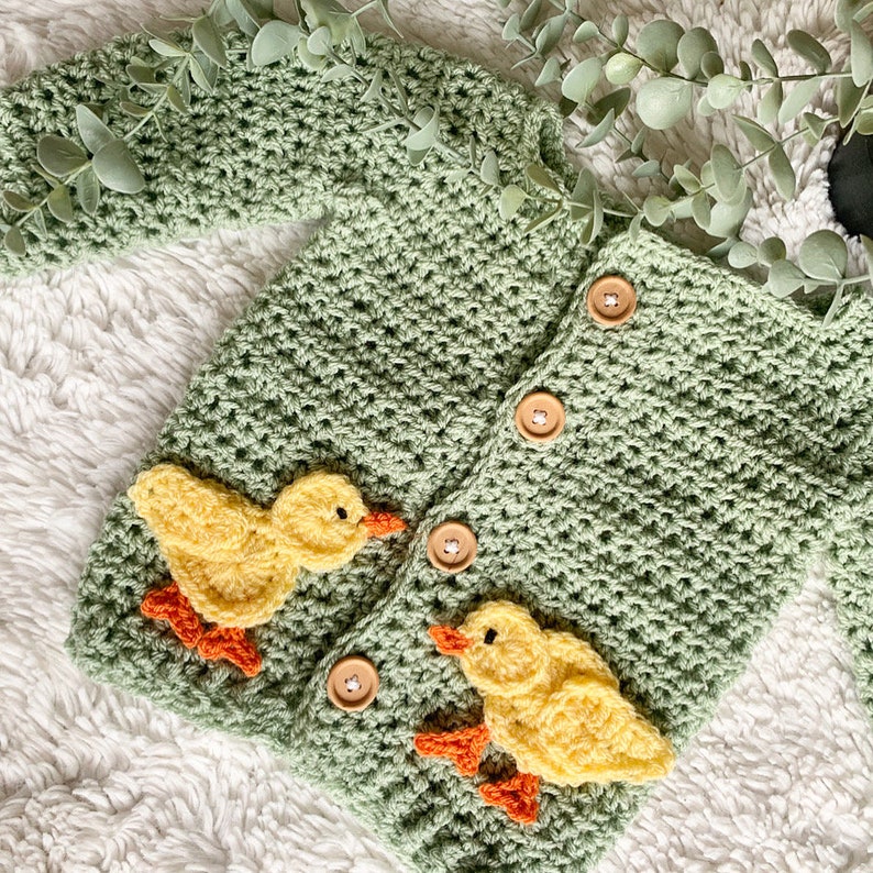 Crochet baby cardigan with Easter chicks