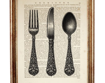 May include: A framed wall art piece featuring a black and white illustration of a fork, a serrated knife, and a spoon with ornate handles, layered over a vintage chemistry textbook page with the heading CHEMISTRY and the page number 99.