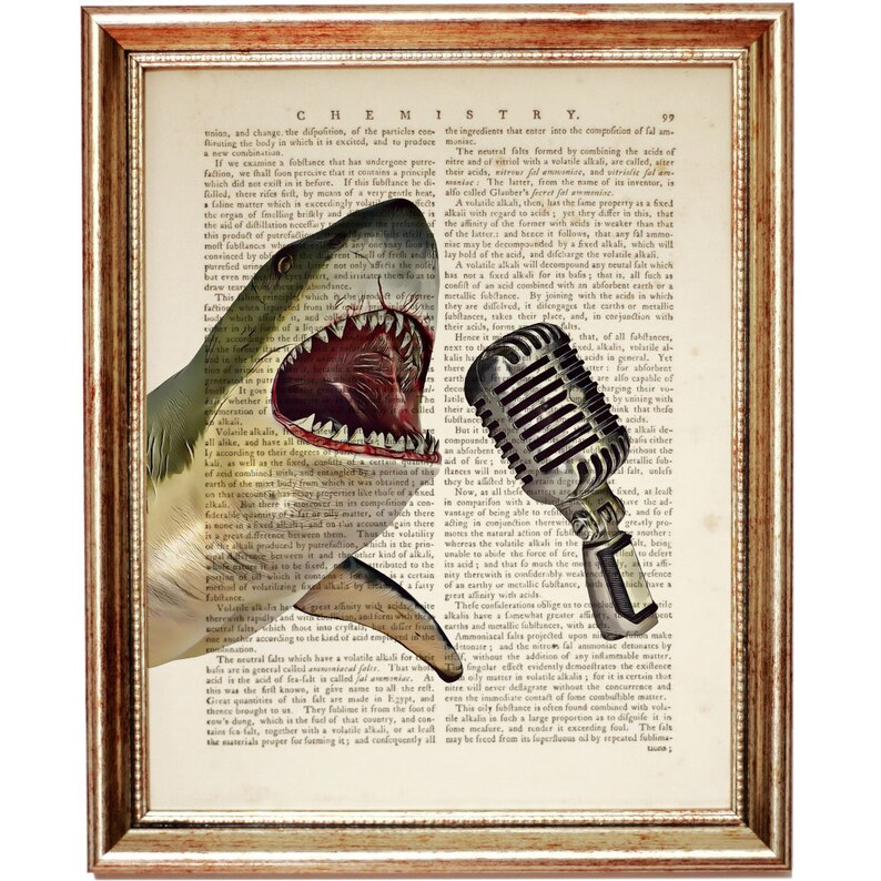 May include: A vintage-style illustration of a shark's head with an open mouth, superimposed on a page from an old book about chemistry. A vintage microphone is positioned in front of the shark's mouth, as if the shark is about to speak.
