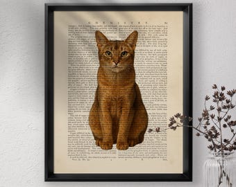 May include: Framed print featuring a detailed illustration of a brown cat with amber eyes, set against a vintage book page background. The cat is centered, with the word "CHEMISTRY" visible at the top. A vase with decorative branches is in the corner.