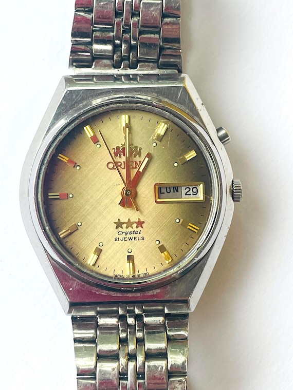 自動巻きオリエント時計、ゴールドカラー文字盤、ヴィンテージ機械式