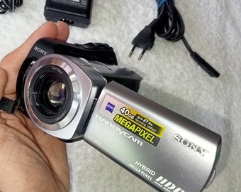Camcorder Sony DCR-SR65E, HDD 40 GB, working condition, Handycam, Carl Zeiss Vario-Tessar, optical zoom 25x, Hybrid, hdd, flash drive, no battery