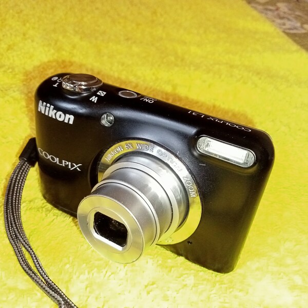 Black working camera Nikon Coolpix L23, 10.1 MP with 5x optical zoom, dust curtains do not work, elegant digital camera