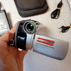 Working video camera Sony DCR-HC23E, PAL mini-DV, optics Carl Zeiss, zoom 40x, 2000x, vintage video camera mini cassettes