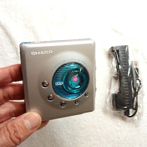 Working Sharp MD-ST700-Z MiniDisc Player Silver Retro MD Walkman, Charger & Maxell Pure Gold 74 MD Disc Bundle, Tested , Working