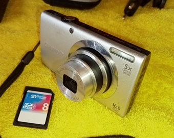 Canon PowerShot A2400IS Working Digital Camera 16MP 5x Optical Zoom Works with SD Card 5.0 - 25.0mm Elegant Camera.
