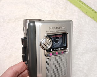 Working mini cassette voice recorder, Panasonic RQ-L11, fast playback, vintage elegant voice recorder