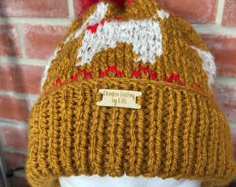 Hand made dog motif bobble hat with removable bobble in mustard coloured Aran wool by Drunken Knitting