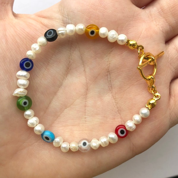 Fresh water Pearl and evil eye beaded bracelet colourful random multicoloured lampwork evil eye beaded bracelet handmade jewellery