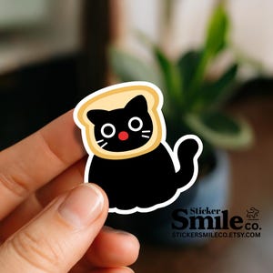 Funny Cat Sticker – Black Cat with Bread Head, Cartoon Vinyl Decal