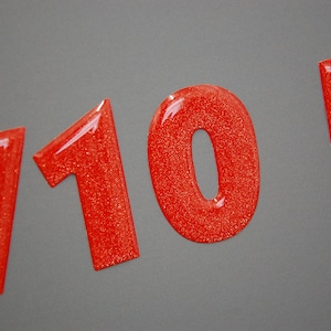 Boat Registration Number Decals. Domed Ultra Metallic Red Boat Decals. Sold as set of 2. Premium 3M boat lettering vinyl.