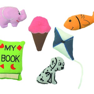 May include: A set of six plush toys for babies and toddlers. The toys include a pink elephant, a green book with the words "MY BOOK" on the cover, a pink and brown ice cream cone, a blue and white kite, an orange fish, and a black and white dalmatian dog.