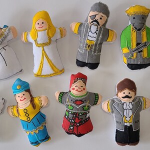 May include: A set of ten felt finger puppets featuring various characters, including a queen, a pirate, a jester, and a soldier. The puppets are colourful and detailed, with embroidered features and accents.