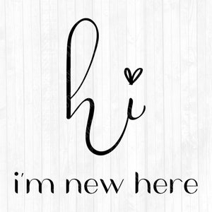 May include: Black script text on a white wood-grain background reads "hi" with a heart above the "i", and "i'm new here" below. The design is simple and modern, suitable for home decor or signage.
