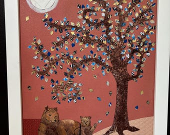 May include: A framed artwork featuring a tree with colorful leaves and a textured trunk. Two brown bears are resting beneath the tree. The background is a reddish-orange color with a white moon.