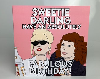 May include: Pink greeting card with a cartoon illustration of two women. The text on the card reads "Sweetie Darling Have an Absolutely Fabulous Birthday!"