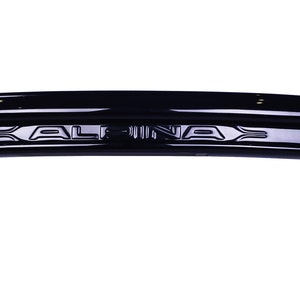 May include: Black plastic rear bumper spoiler for a car. The spoiler has the word "CALINA" embossed on it.