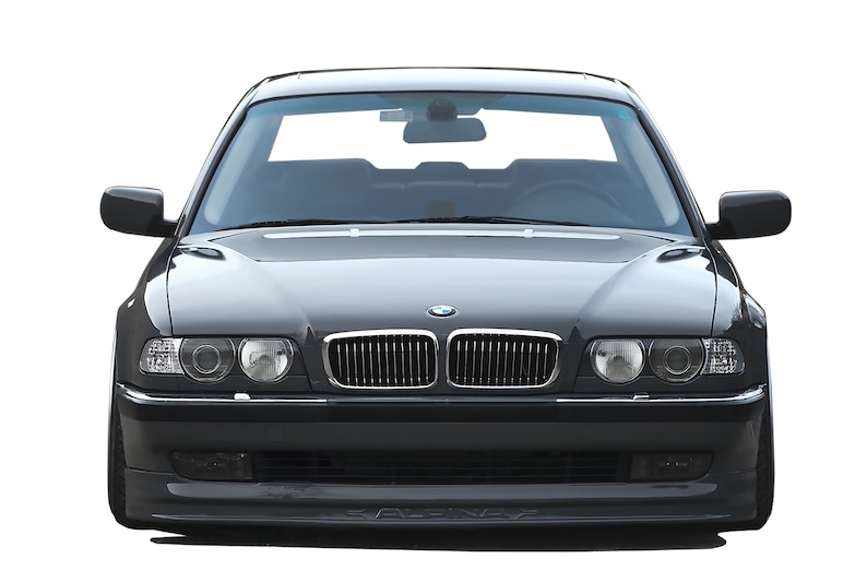 May include: A black BMW 7 Series sedan with a chrome grille and headlights. The car is parked on a white background.