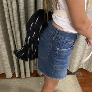 6. Black/white faux fur wolf tail